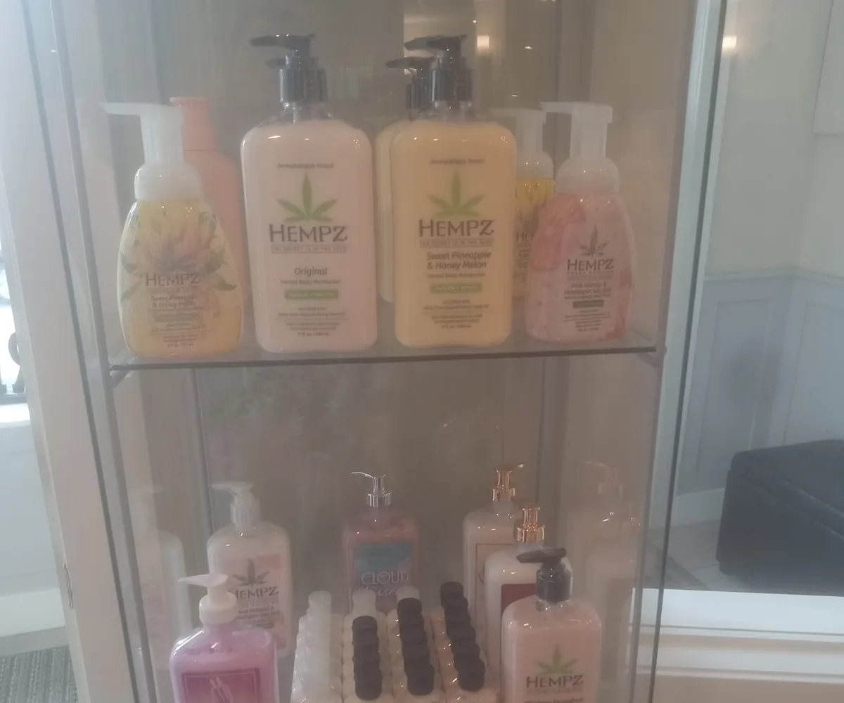 Hempz body lotions in a glass display case at Renew You